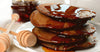 Chocolate pancakes drizzled with syrup