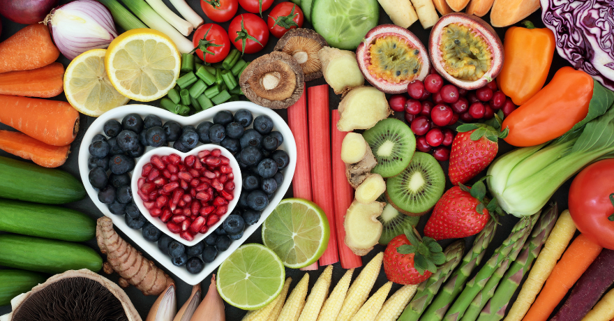 large display of fruits and vegetables