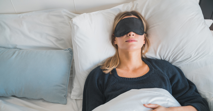 woman sleeping with eye mask